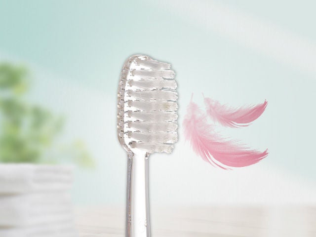 denture brush GUM con plumas