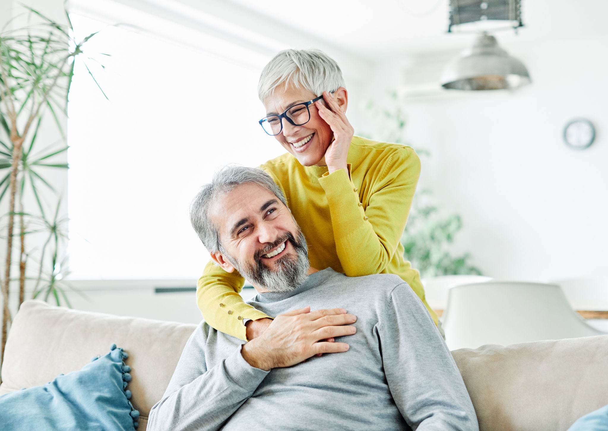 portrait of happy smiling senior couple at home